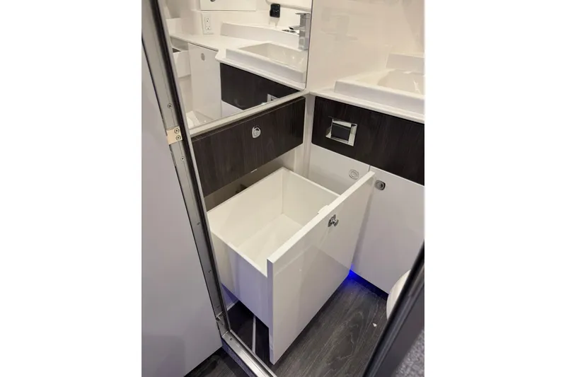 Slide: The Image of Interior storage compartment of 2026 Formula 360 Crossover Bowrider I/O boat. - 188