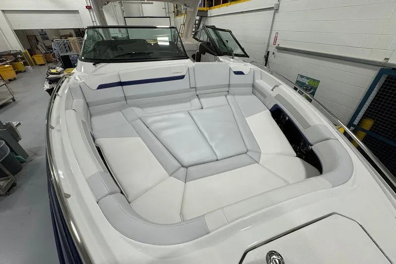 Slide: The Image of 2026 Formula 360 Crossover Bowrider I/O with spacious seating in a workshop setting. - 126