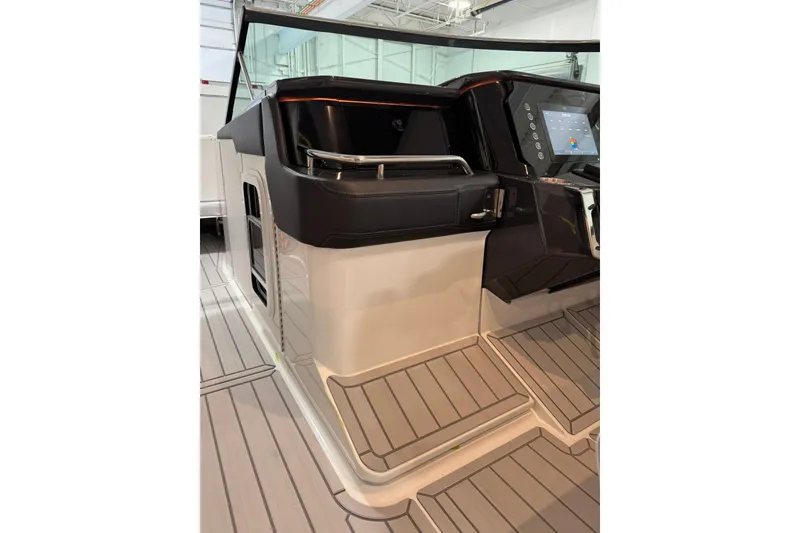Slide: The Image of 2026 Formula 360 Crossover Bowrider I/O helm with modern dashboard and sleek design. - 132