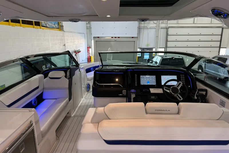 Slide: The Image of Interior view of 2026 Formula 360 Crossover Bowrider I/O with modern dashboard and seating. - 91