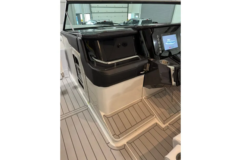 Slide: The Image of 2026 Formula 360 Crossover Bowrider I/O interior with sleek dashboard and modern controls. - 76