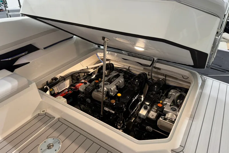 Slide: The Image of Engine compartment of 2026 Formula 360 Crossover Bowrider I/O, showcasing dual engines. - 72