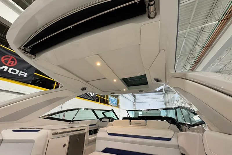 Slide: The Image of Interior view of 2026 Formula 360 Crossover Bowrider I/O, showcasing sleek design and seating. - 52