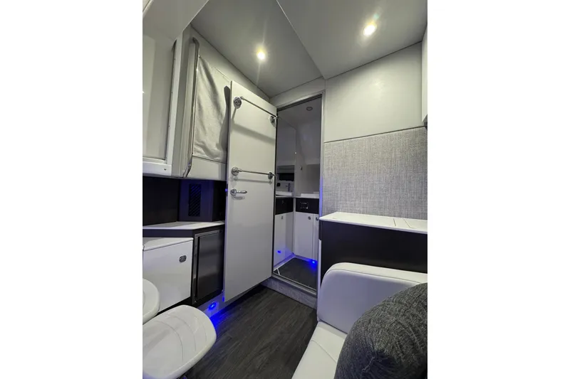 Slide: The Image of Interior of 2026 Formula 360 Crossover Bowrider I/O, featuring modern design and ambient lighting. - 178