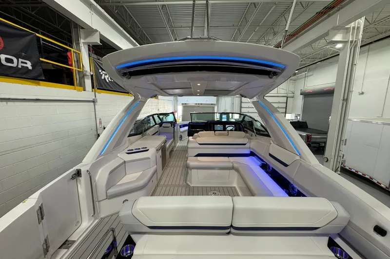 Slide: The Image of 2026 Formula 360 Crossover Bowrider I/O interior with modern seating and ambient lighting. - 92