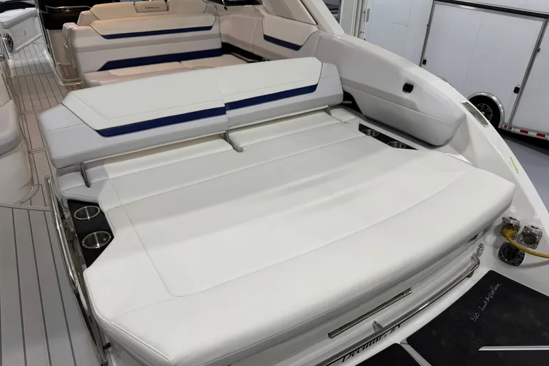 Slide: The Image of 2026 Formula 360 Crossover Bowrider I/O with spacious white seating and cup holders. - 46