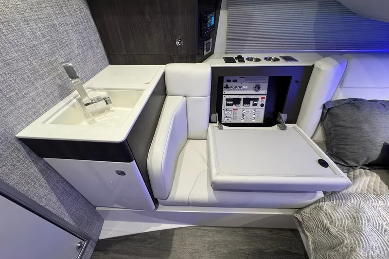 Slide: The Image of Interior of 2026 Formula 360 Crossover Bowrider I/O with sink and control panel. - 154