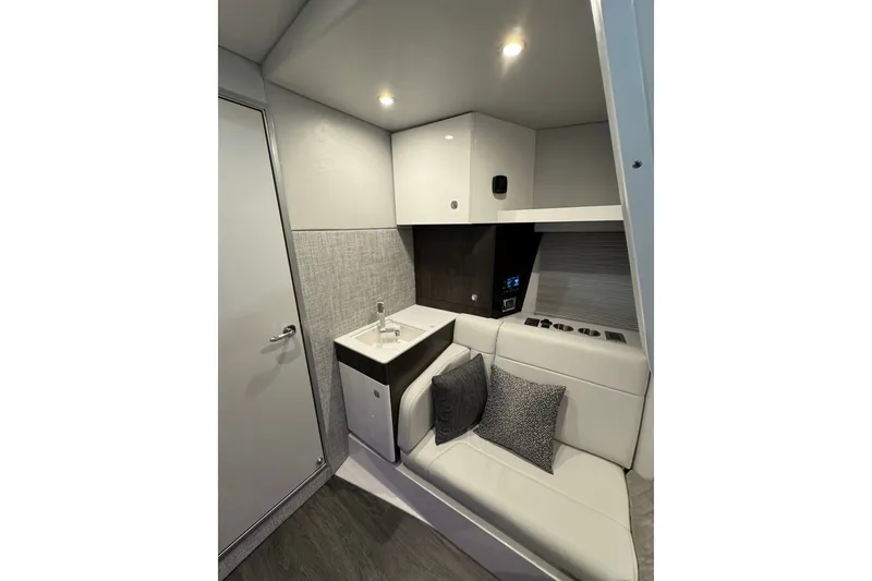 Slide: The Image of Interior of 2026 Formula 360 Crossover Bowrider I/O, featuring modern seating and compact sink area. - 138
