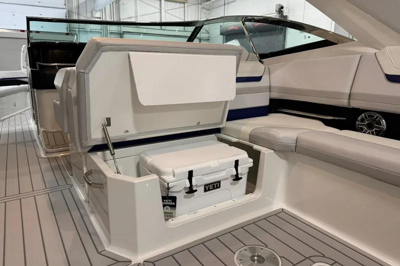 Slide: The Image of 2026 Formula 360 Crossover Bowrider I/O interior with seating and Yeti cooler storage. - 53