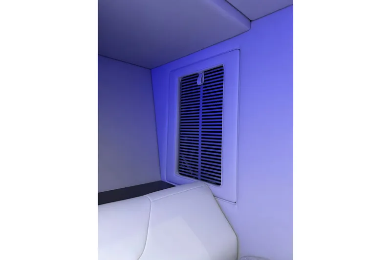 Slide: The Image of Interior view of 2026 Formula 360 Crossover Bowrider I/O with blue ambient lighting. - 163