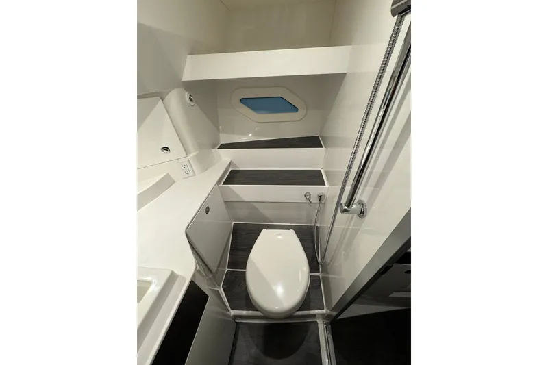 Slide: The Image of Modern bathroom in 2026 Formula 360 Crossover Bowrider I/O boat, featuring sleek design and fixtures. - 8