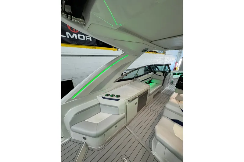 Slide: The Image of 2026 Formula 360 Crossover Bowrider I/O interior with sleek seating and ambient lighting. - 34