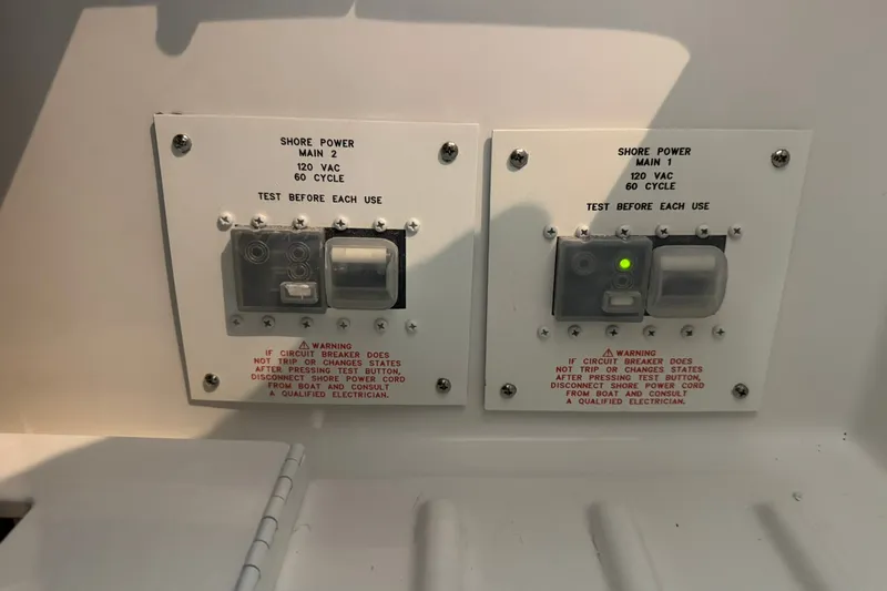 Slide: The Image of Shore power control panel on 2026 Formula 360 Crossover Bowrider I/O boat. - 70