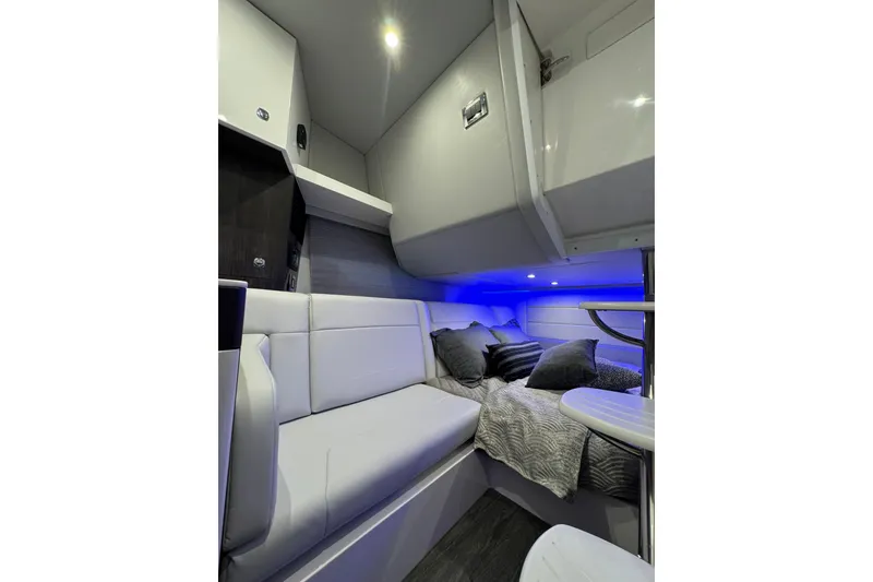 Slide: The Image of Luxurious interior cabin of 2026 Formula 360 Crossover Bowrider I/O with modern seating and ambient lighting. - 159