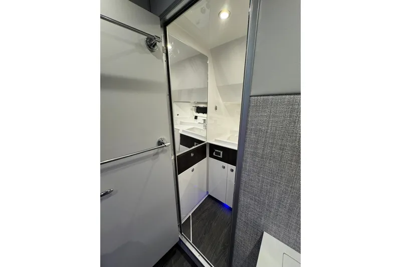 Slide: The Image of Interior view of 2026 Formula 360 Crossover Bowrider I/O cabin with modern cabinetry. - 191