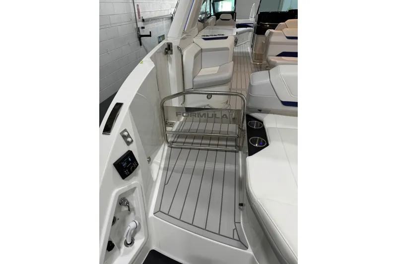 Slide: The Image of 2026 Formula 360 Crossover Bowrider I/O interior with sleek seating and modern design. - 24