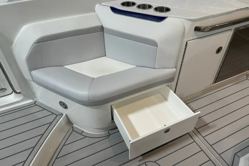 Slide: The Image of 2026 Formula 360 Crossover Bowrider I/O interior with seating and storage drawer. - 35