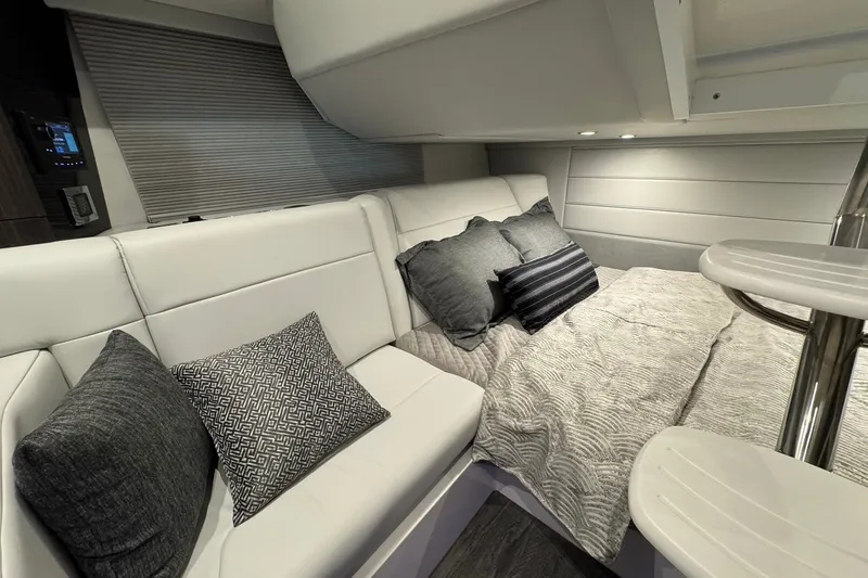 Slide: The Image of Luxurious interior of 2026 Formula 360 Crossover Bowrider I/O with plush seating and bedding. - 149