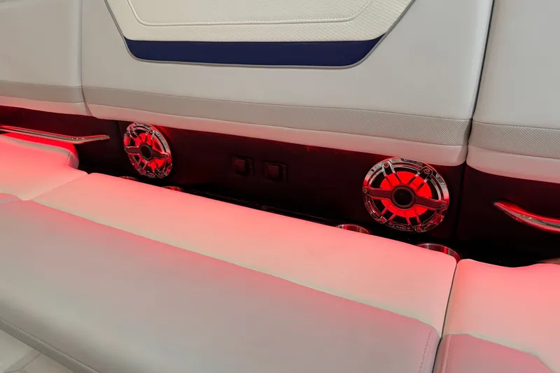 Slide: The Image of 2026 Formula 360 Crossover Bowrider I/O interior with red LED lighting and speakers. - 74