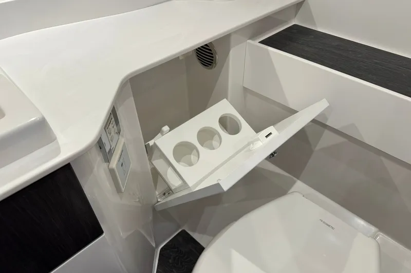 Slide: The Image of Interior of 2026 Formula 360 Crossover Bowrider I/O with fold-out cup holder. - 186