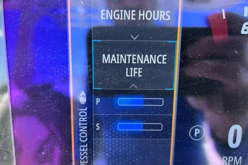 Slide: The Image of Display screen showing engine hours and maintenance status on 2022 Sea Pro 320 DLX Offshore. - 58