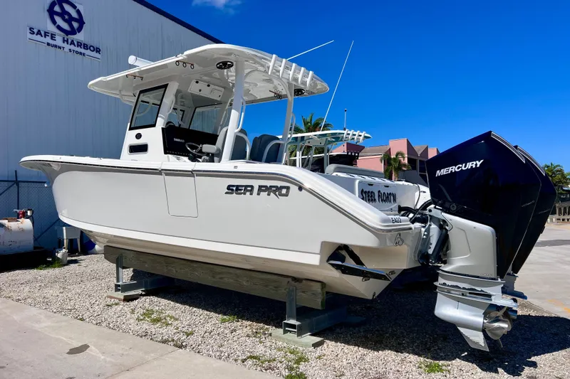 Slide: The Image of 2022 Sea Pro 320 DLX Offshore boat with Mercury engines at Safe Harbor marina. - 15