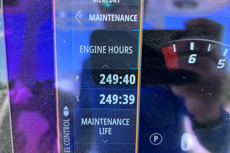 Slide: The Image of Digital display showing engine hours for 2022 Sea Pro 320 DLX Offshore boat. - 57