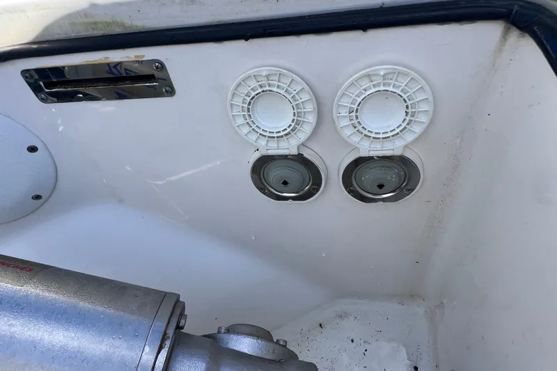 Slide: The Image of 2022 Sea Pro 320 DLX Offshore boat deck with dual drainage outlets. - 73