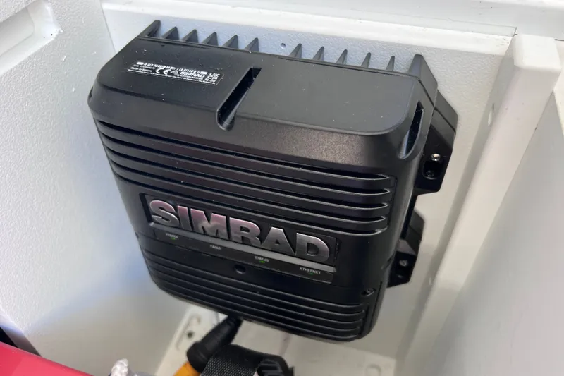 Slide: The Image of Simrad marine device installed on 2022 Sea Pro 320 DLX Offshore boat. - 84