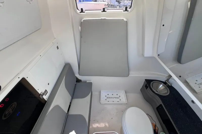 Slide: The Image of Interior of 2022 Sea Pro 320 DLX Offshore boat with seating and sink. - 87