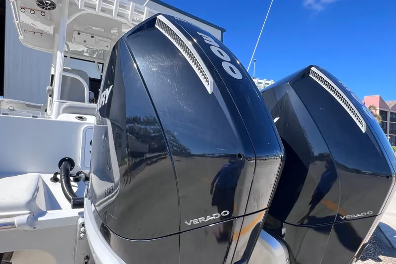 Slide: The Image of Twin Mercury Verado engines on a 2022 Sea Pro 320 DLX Offshore boat. - 27