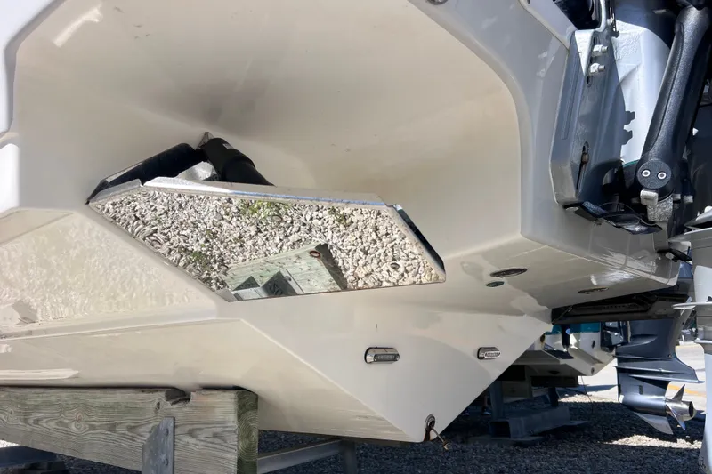 Slide: The Image of 2022 Sea Pro 320 DLX Offshore boat hull and engine detail. - 24