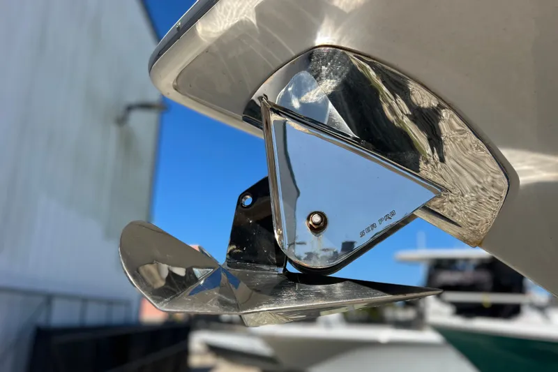 Slide: The Image of Close-up of 2022 Sea Pro 320 DLX Offshore boat's polished metal trim tab. - 22