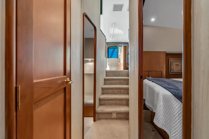 Slide: The Image of Interior of the 2007 Ocean Yachts 46 Super Sport with stairs and sleeping area. - 39
