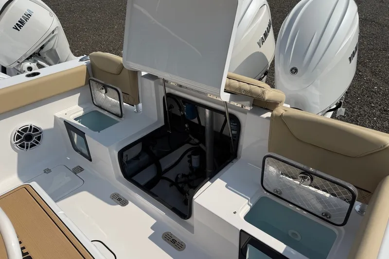 Slide: The Image of 2027 Sportsman Heritage 261 Center Console boat interior with Yamaha engines. - 15
