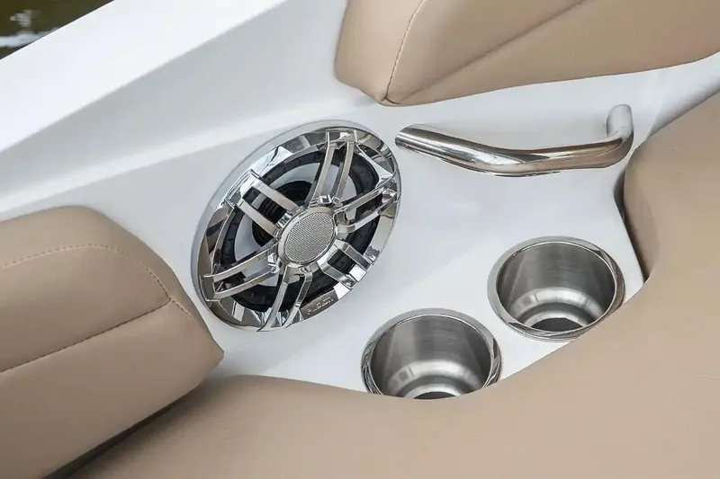 Slide: The Image of Manufacturer Provided Image: 2026 Hurricane SunDeck Sport 185 OB interior with speaker and cup holders. - 7