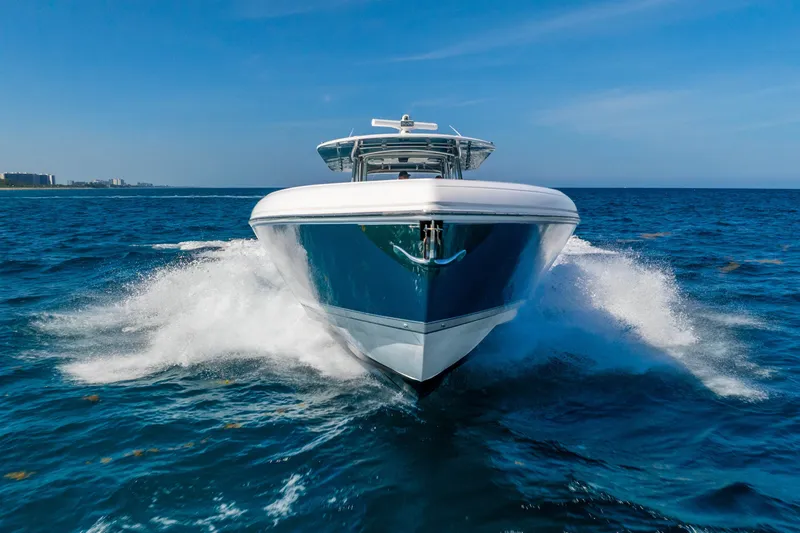 Slide: The Image of 2015 Intrepid 475 Panacea cruising on open blue ocean waters. - 4
