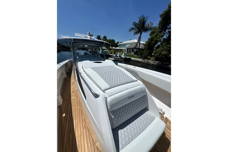Slide: The Image of 2015 Intrepid 475 Panacea boat with sleek design and luxurious seating. - 13