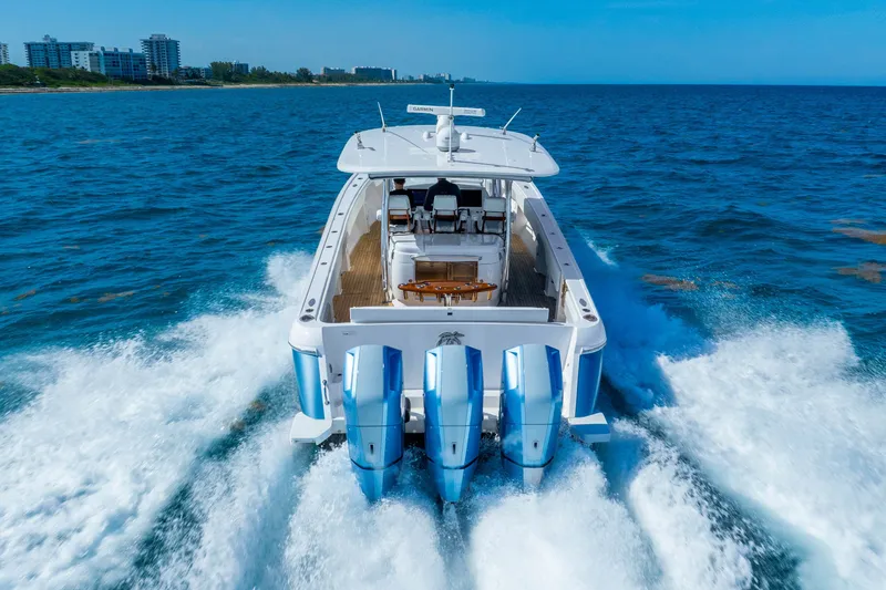Slide: The Image of 2015 Intrepid 475 Panacea cruising on open ocean with powerful engines. - 3