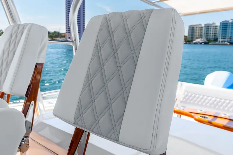 Slide: The Image of Luxurious seating on a 2015 Intrepid 475 Panacea boat with waterfront view. - 20