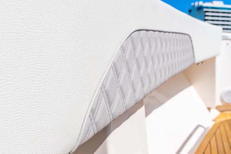 Slide: The Image of Close-up of 2015 Intrepid 475 Panacea's luxurious white quilted upholstery detail. - 21