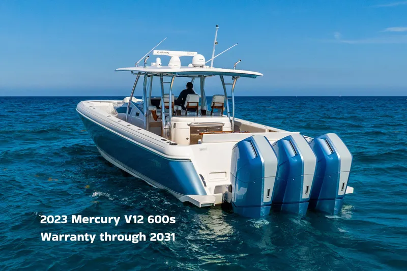 Slide: The Image of 2015 Intrepid 475 Panacea boat with 2023 Mercury V12 engines, warranty through 2031. - 0