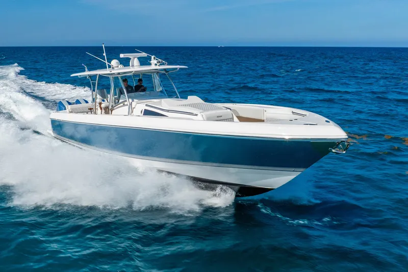Slide: The Image of 2015 Intrepid 475 Panacea cruising on open blue ocean waters. - 5