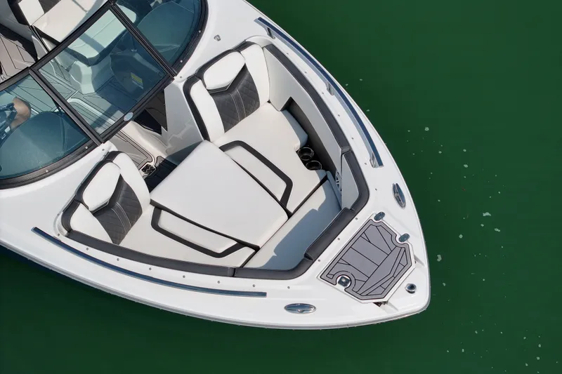 Slide: The Image of 2023 Monterey 235SS Super Sport boat interior on green water. - 23