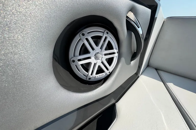 Slide: The Image of Close-up of a 2023 Monterey 235SS Super Sport boat speaker and seating area. - 21