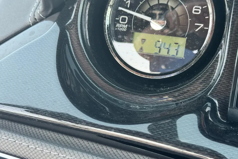 Slide: The Image of Close-up of 2023 Monterey 235SS Super Sport RPM gauge displaying 943 RPM. - 20