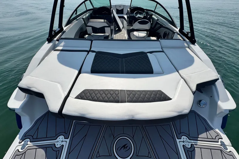 Slide: The Image of 2023 Monterey 235SS Super Sport boat interior with sleek seating and modern design. - 9