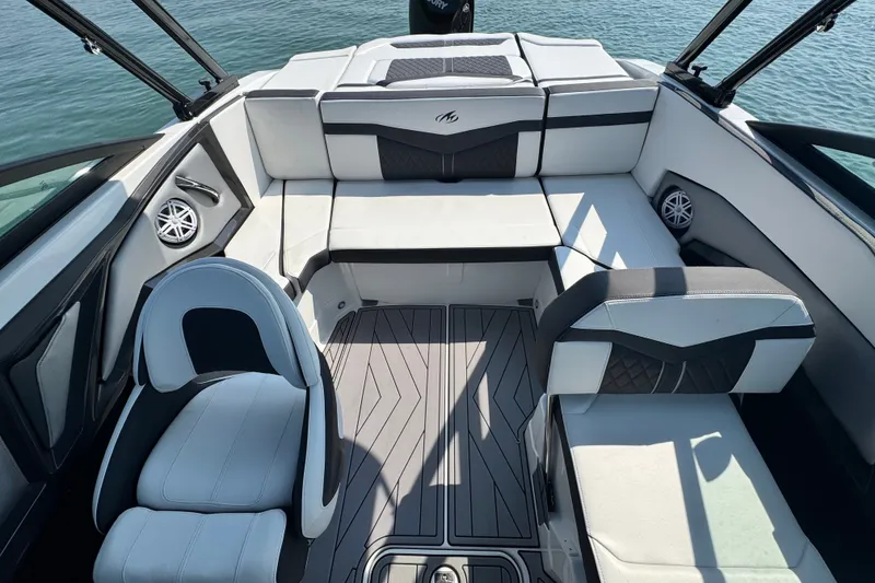 Slide: The Image of 2023 Monterey 235SS Super Sport boat interior with stylish seating and modern design. - 14