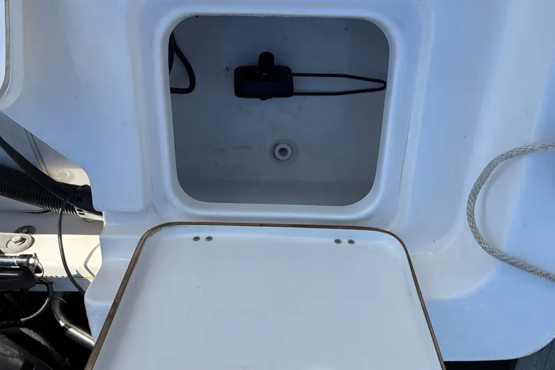 Slide: The Image of Open storage compartment on a 2019 Tidewater 2200 Carolina Bay boat. - 43