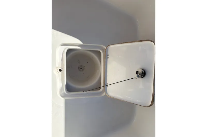 Slide: The Image of Open storage compartment on 2019 Tidewater 2200 Carolina Bay boat. - 45